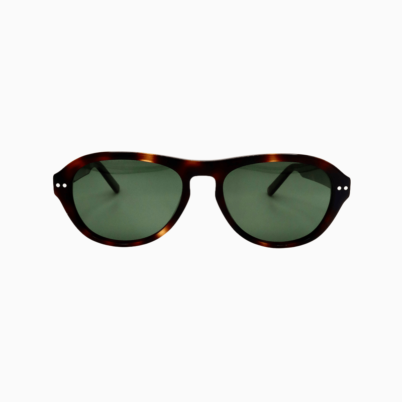 Close-up of Ciren glossy tortoiseshell acetate frame and green lenses
